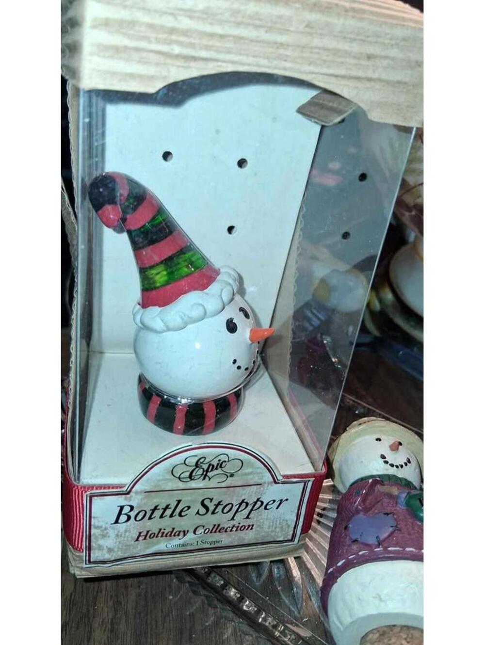 snowman-themed wine bottle stopper from the "Holiday Collection" by Epic.